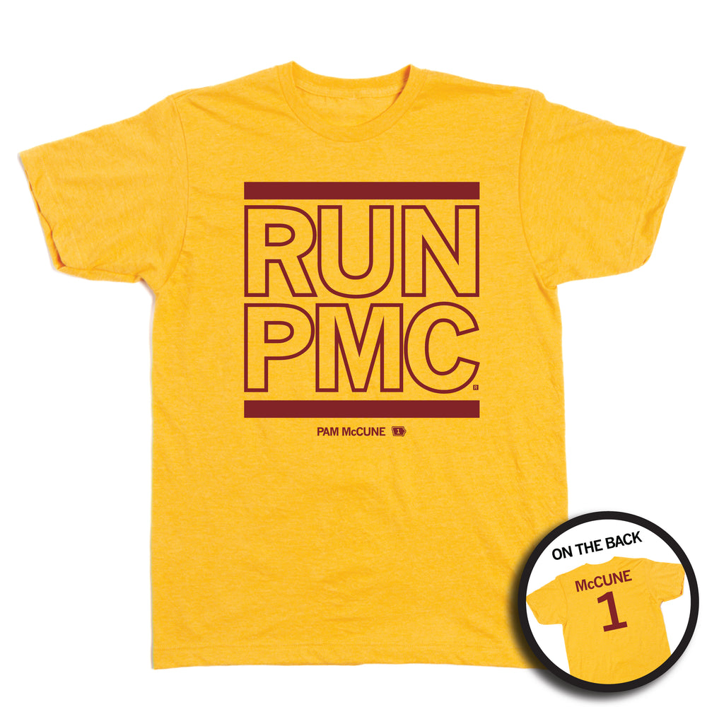 A short sleeve heather yellow t-shirt with cardinal ink print that says, "RUN PMC" in large, outlined text with a thick red line printed above and below. Smaller print at the bottom reads "PAM McCune" beside a tiny Iowa with the number 1 in it. A small picture in a circle frame in the bottom right shows the back of the shirt. The back of the shirt is printed like a jersey with "McCune" across the shoulders above a large number 1.