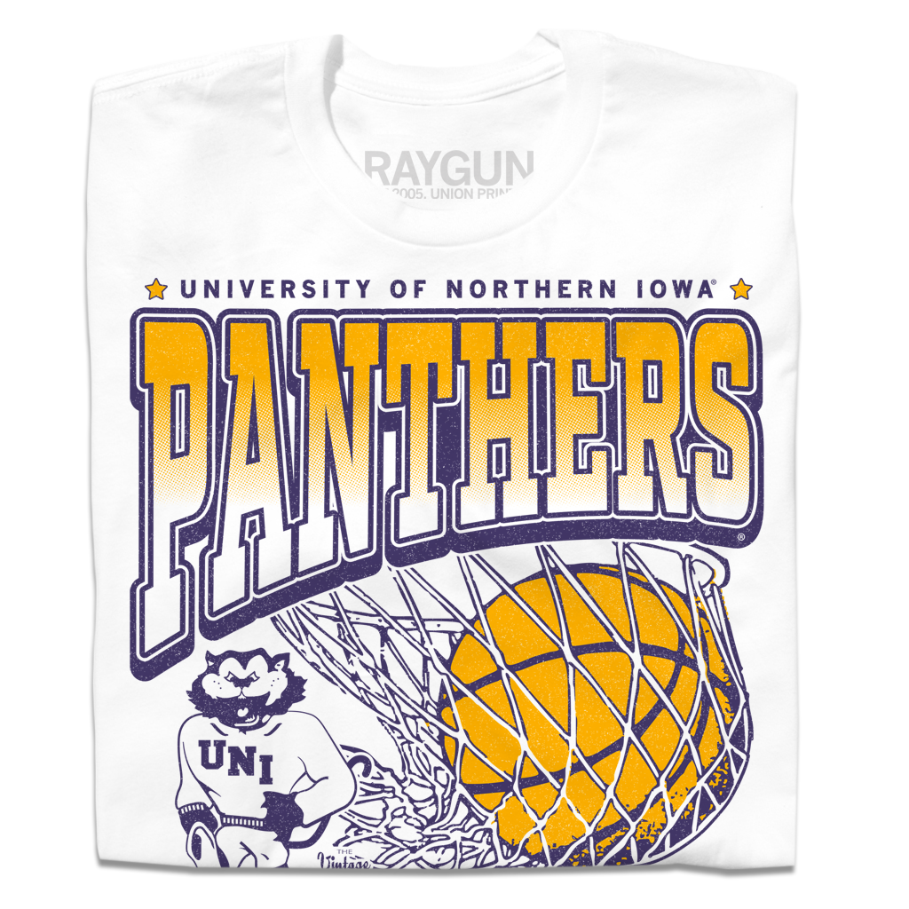 A folded white t-shirt with purple & gold ink depicting the University of Northern Iowa's panther mascot beside a giant basketball going through a net. Text reads "University of Northern Iowa Panthers Basketball. Cedar Falls, McLeod Center."