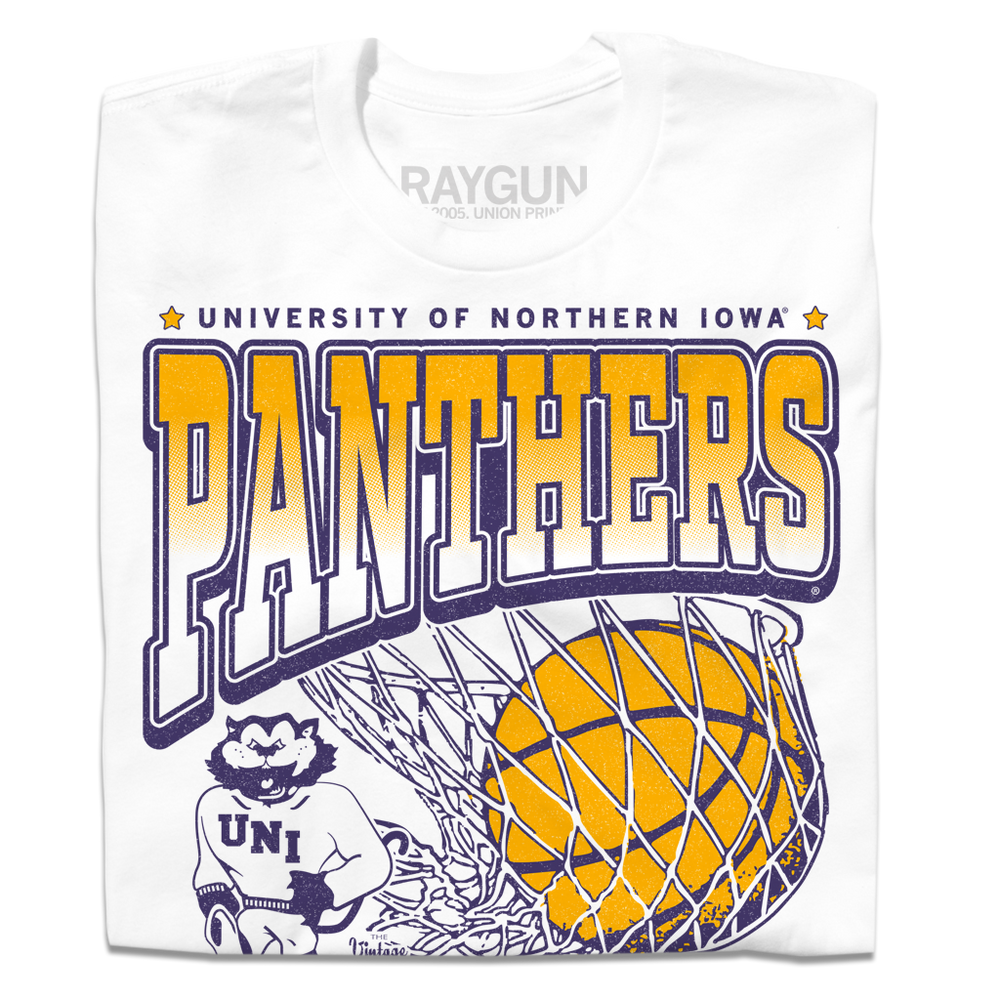 A folded white t-shirt with purple & gold ink depicting the University of Northern Iowa's panther mascot beside a giant basketball going through a net. Text reads "University of Northern Iowa Panthers Basketball. Cedar Falls, McLeod Center."