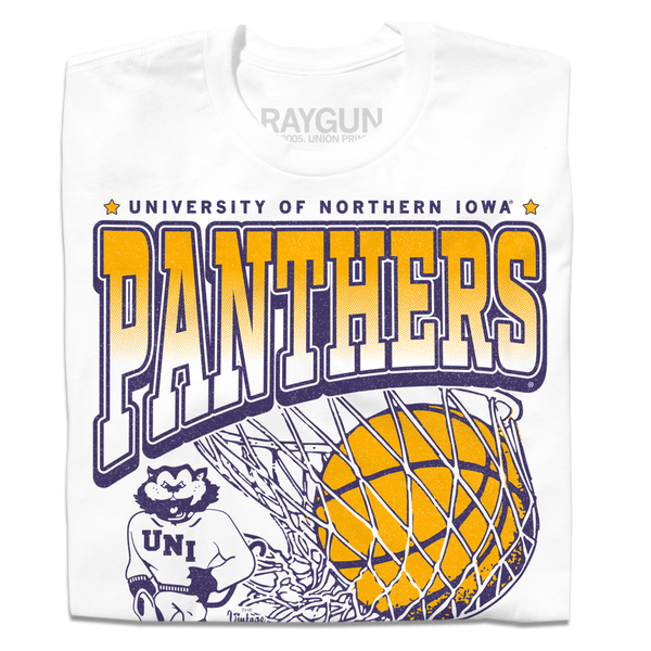 A folded white t-shirt with purple & gold ink depicting the University of Northern Iowa's panther mascot beside a giant basketball going through a net. Text reads 
