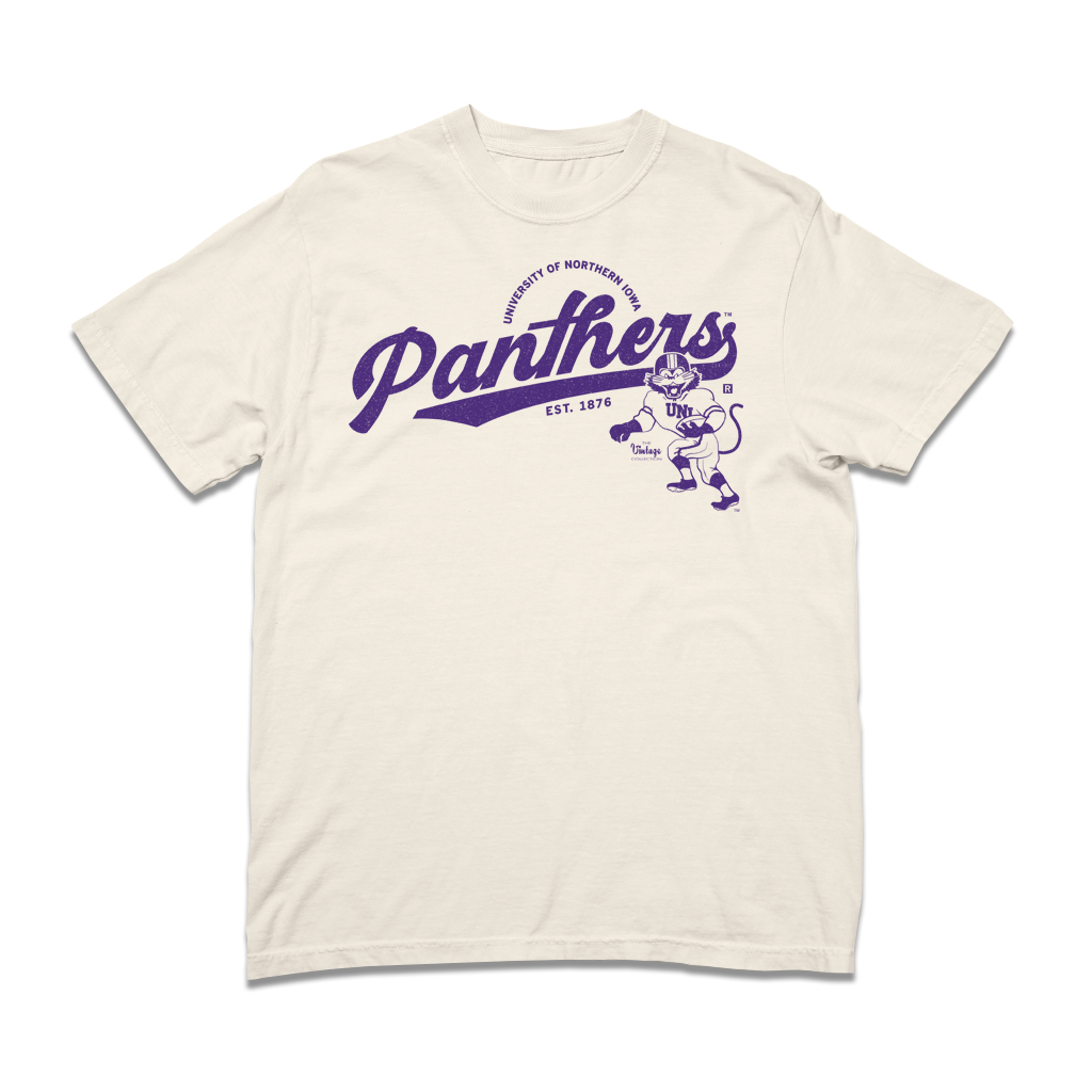 Heavyweight ivory crewneck t-shirt featuring the purple University of Northern Iowa Panthers logo and a mascot graphic.