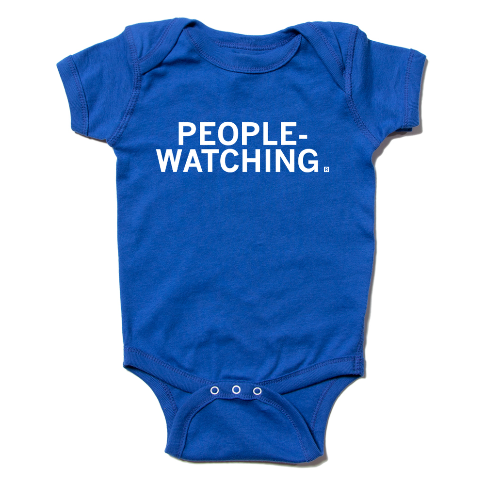 Royal blue baby onesie with white print text that says, "PEOPLE-WATCHING."