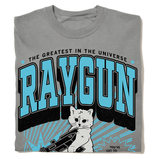 Gray RAYGUN heavyweight t-shirt featuring a cartoon cat holding a raygun with the text The Greatest in the Universe and Youve Cat To.