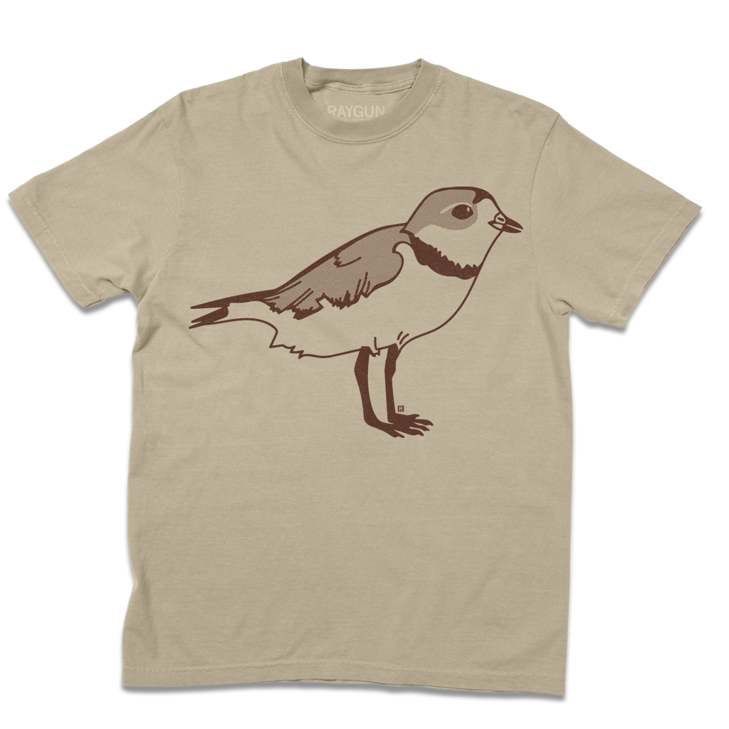 Khaki short-sleeve t-shirt with a brown ink image of a plover from its side.