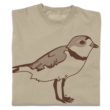 A folded khaki crewneck t-shirt with a brown ink illustration of a plover.