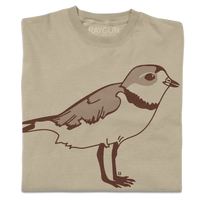 A folded khaki crewneck t-shirt with a brown ink illustration of a plover.