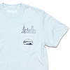 Zoom in of a light blue pocket t-shirt with navy ink. An illustration of the Chicago skyline is printed above the pocket with the Cloud Gate statue printed on the pocket.