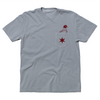 Grey pocket tee with dark red print. A Chicago star is printed on the pocket with an illustration of a pigeon appearing out of the pocket.
