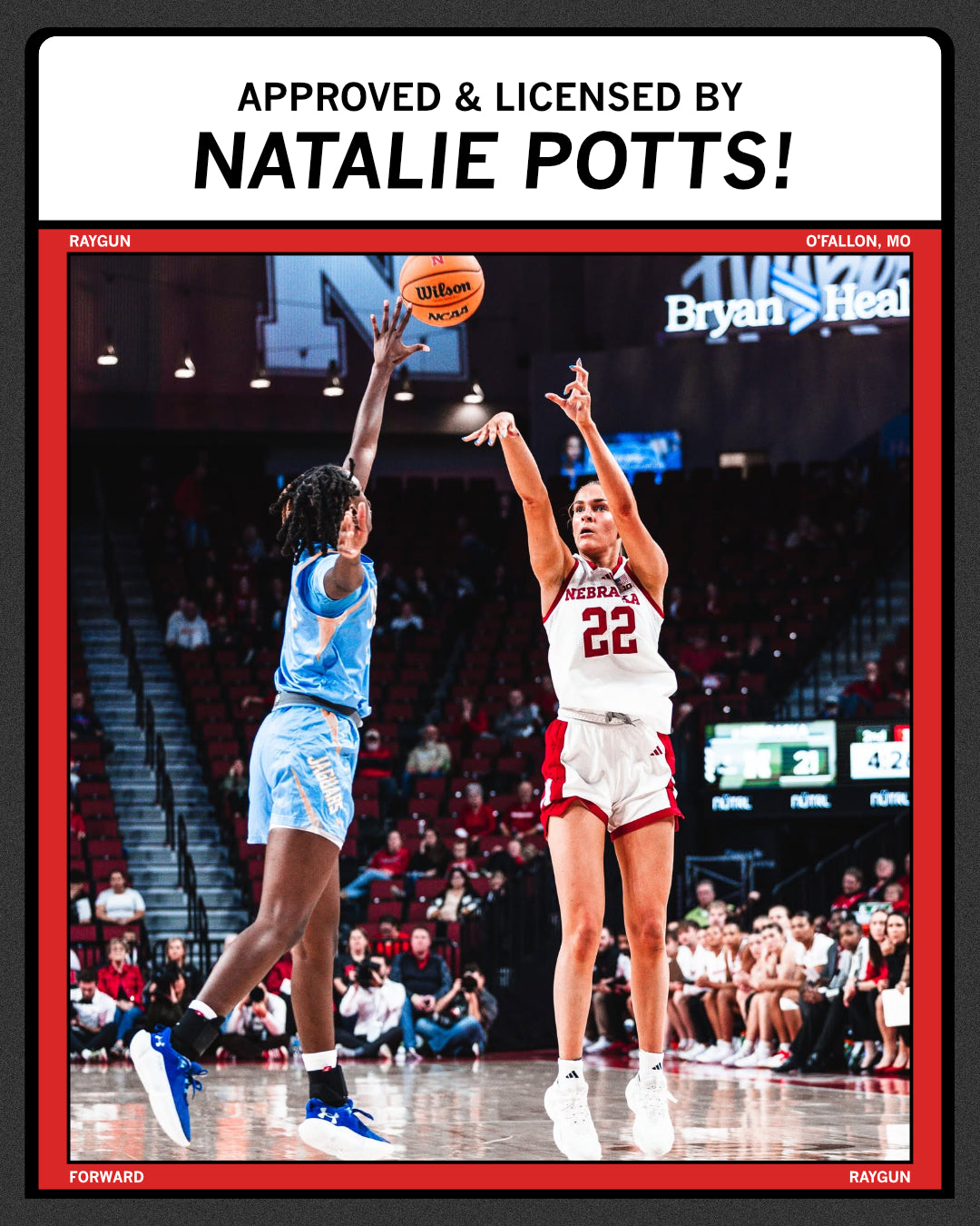 Nebraska basketball player number 22, wearing a Natalie Potts t-shirt, takes a jump shot while being defended by an opponent during a game.