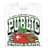 White t-shirt with text in black, green, and white that reads "Just another proud public educator. Teach, change lives, repeat" around a red apply with a bookworm popping out and a stack of red & green books in the back.