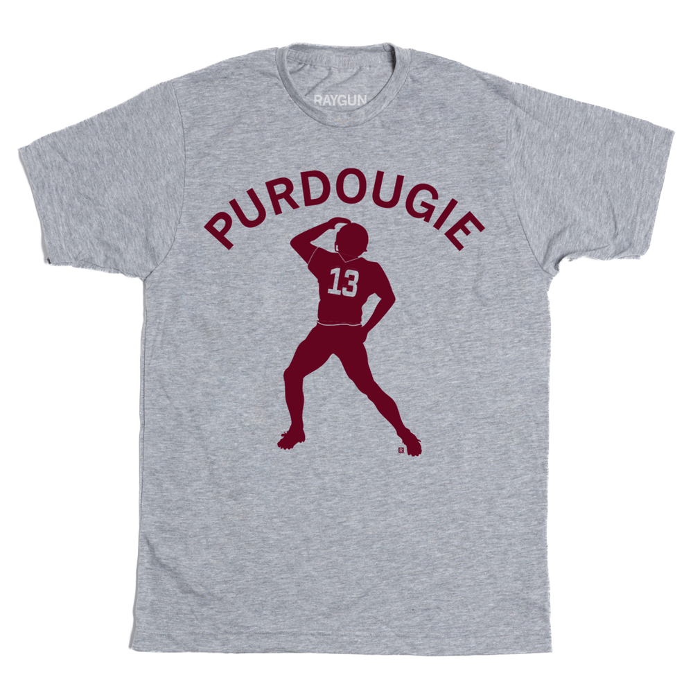 A heather grey t-shirt with maroon ink that reads "Purdoughie" of an illustration of Brock Purdy doing The Dougie