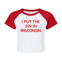 White baby tee with red sleaves and red ink printed to say, "I put the sin in Wisconsin"