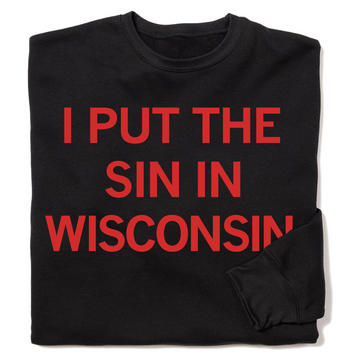 Folded black sweatshirt with red text that reads "I Put The Sin In Wisconsin"