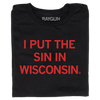 A folded black t-shirt with bright red text that reads "I Put The Sin In Wisconsin"