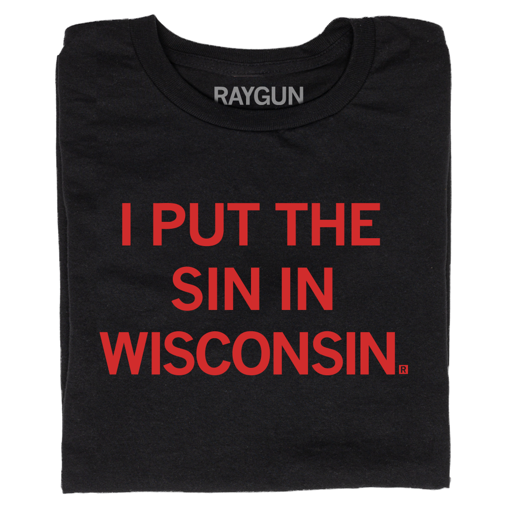 A folded black t-shirt with bright red text that reads "I Put The Sin In Wisconsin"