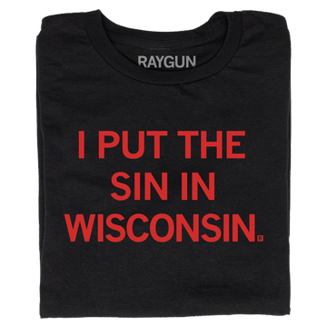 A folded black t-shirt with bright red text that reads "I Put The Sin In Wisconsin"