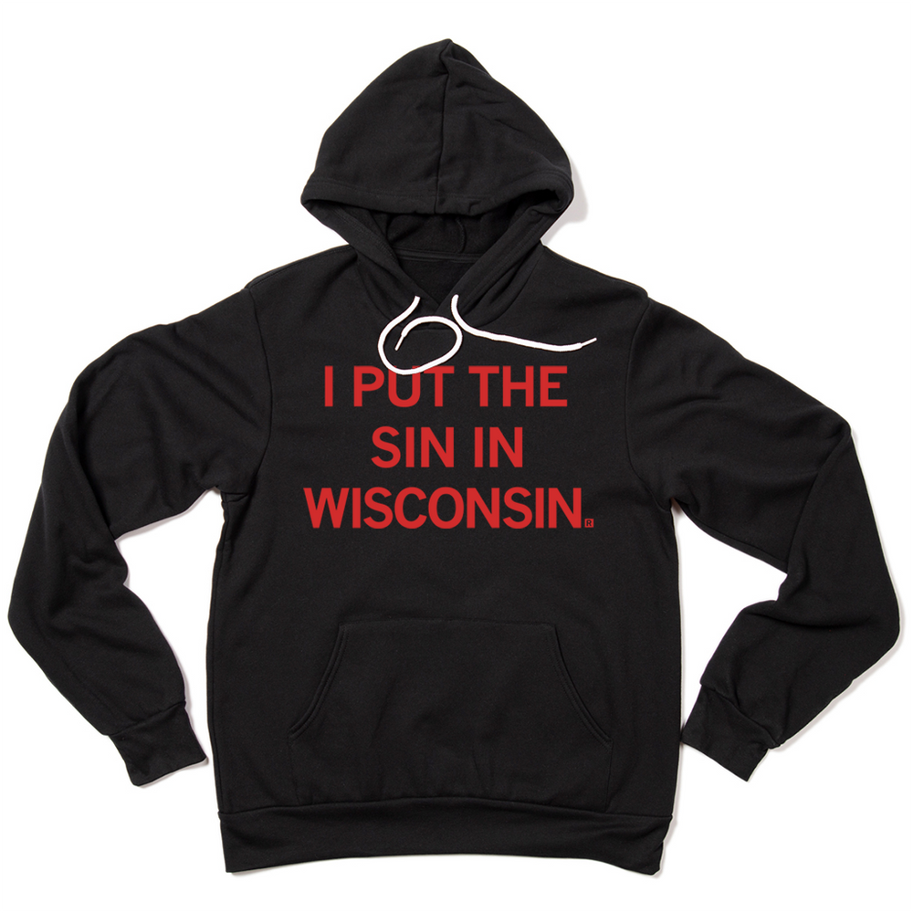"I Put The Sin In Wisconsin." printed in red in on a black pullover hoodie.