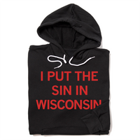 Folded black hoodie with red ink text that says, "I Put The Sin In Wisconsin."