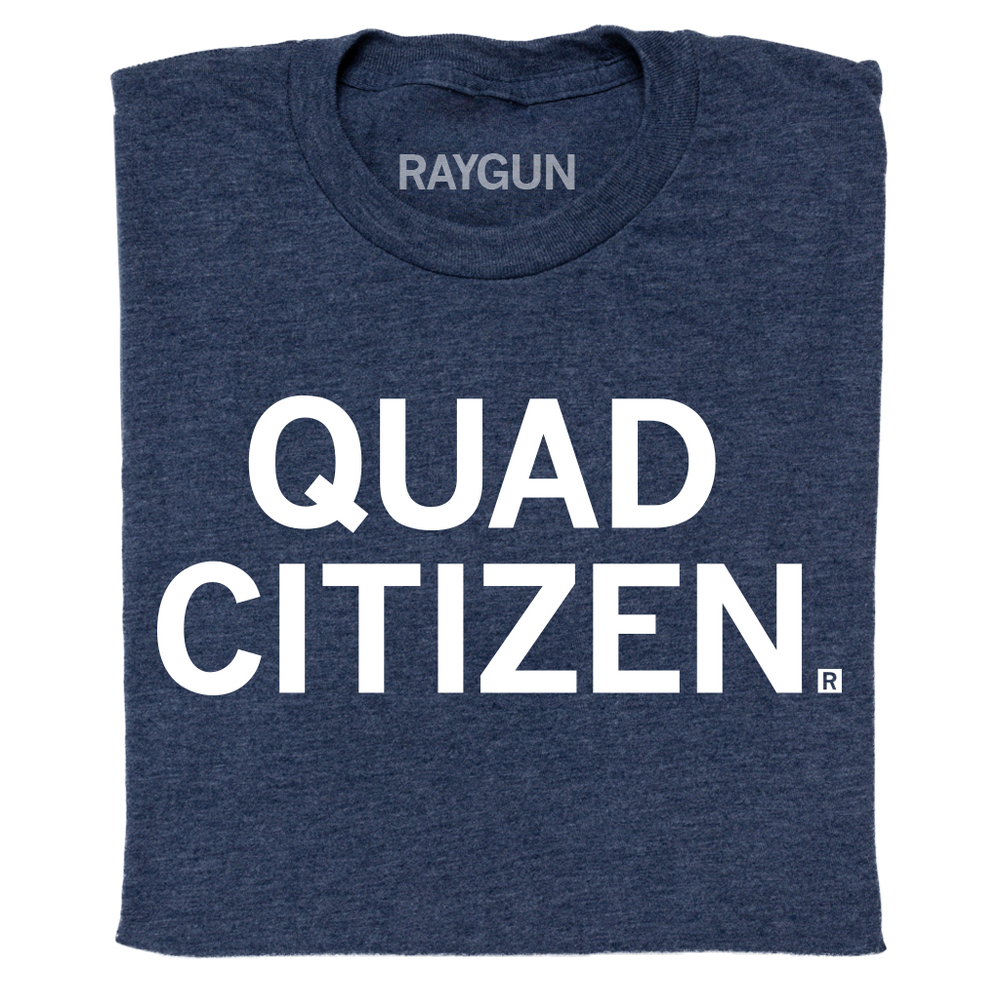A folded heather navy t-shirt with centered white ink text that reads "Quad Citizen"