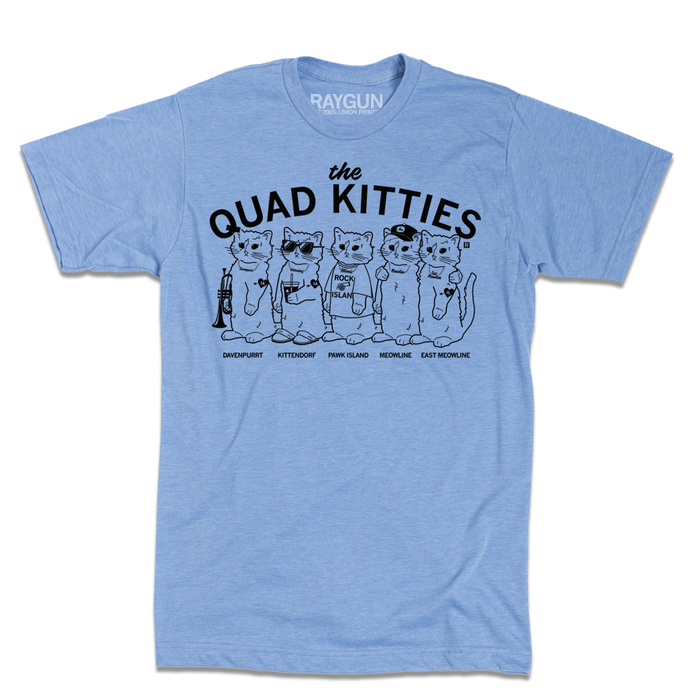 An athletic blue t-shirt with black ink that reads "The Quad Kitties: Davenpurrt, Kittendorf, Pawk Island, Meowline, East Meowline" with illustrations of five differently dressed cats in a line.