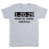 Light gray union made T-shirt with the text 1-20-29 inside a black box, followed by the text HANG IN THERE, AMERICA! in this election t-shirt design.