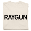 A folded cream heavyweight t-shirt with "RAYGUN" printed in black ink.