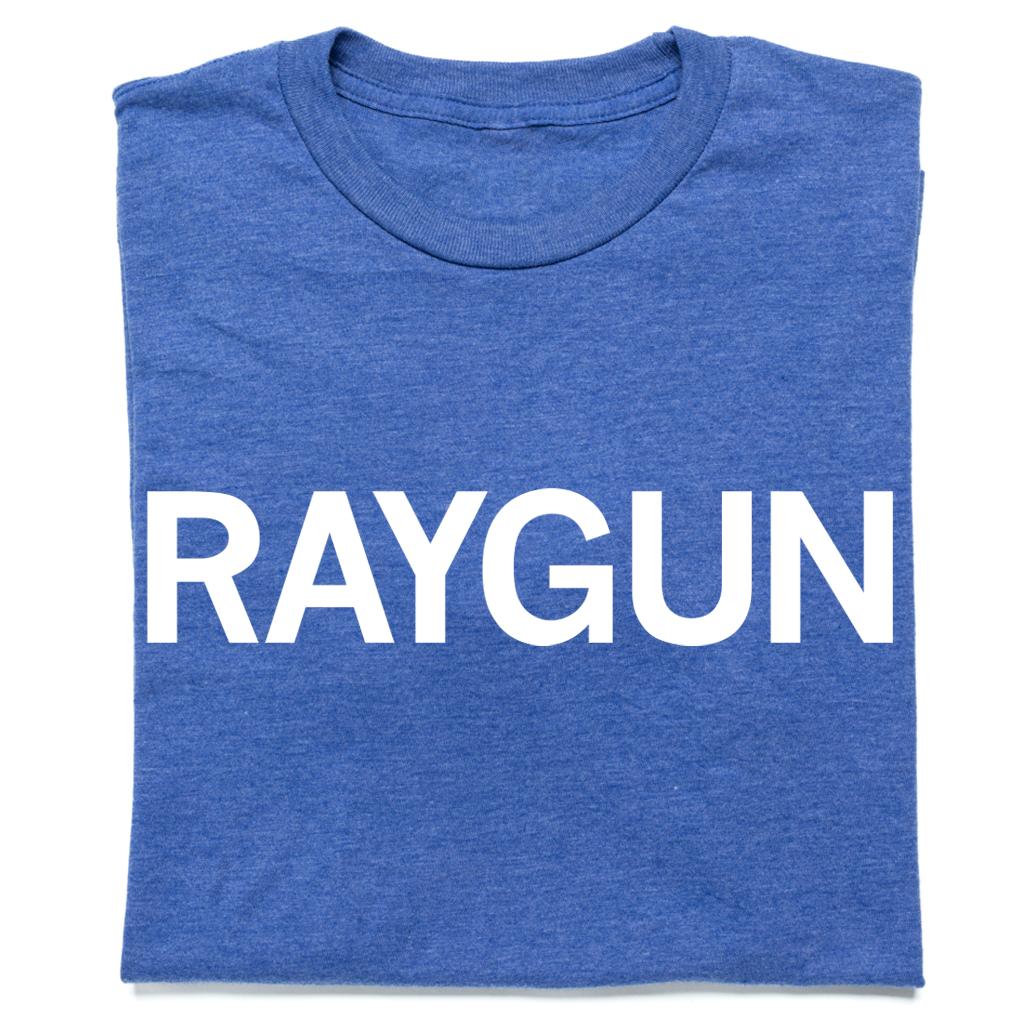 A folded heather royal blue t-shirt with "RAYGUN" printed in white text.