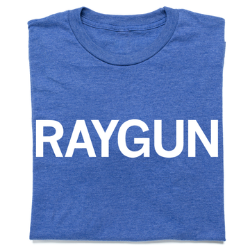 A folded heather royal blue t-shirt with "RAYGUN" printed in white text.
