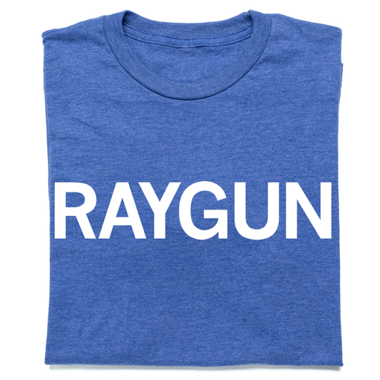 A folded heather royal blue t-shirt with "RAYGUN" printed in white text.