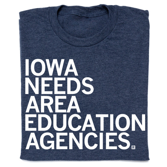 Navy blue union made crew neck t-shirt with the text IOWA NEEDS AREA EDUCATION AGENCIES printed in white to support Iowa public schools.
