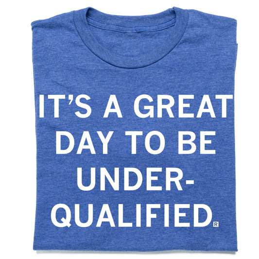 Blue heather royal T-shirt featuring the text ITS A GREAT DAY TO BE UNDER-QUALIFIED printed in white.
