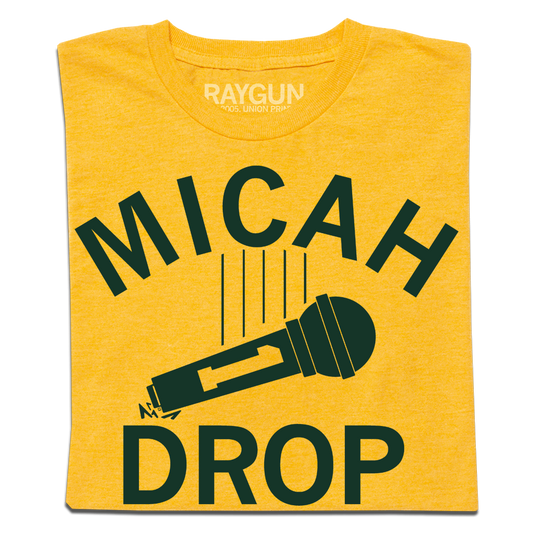 Mellow yellow t-shirt featuring green text that reads MICAH DROP and an illustration of a microphone.