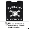 Black sweatshop-free T-shirt featuring a white volleyball crossed with two bones, with the text NEBRASKA above and BLACKSHORTS below.