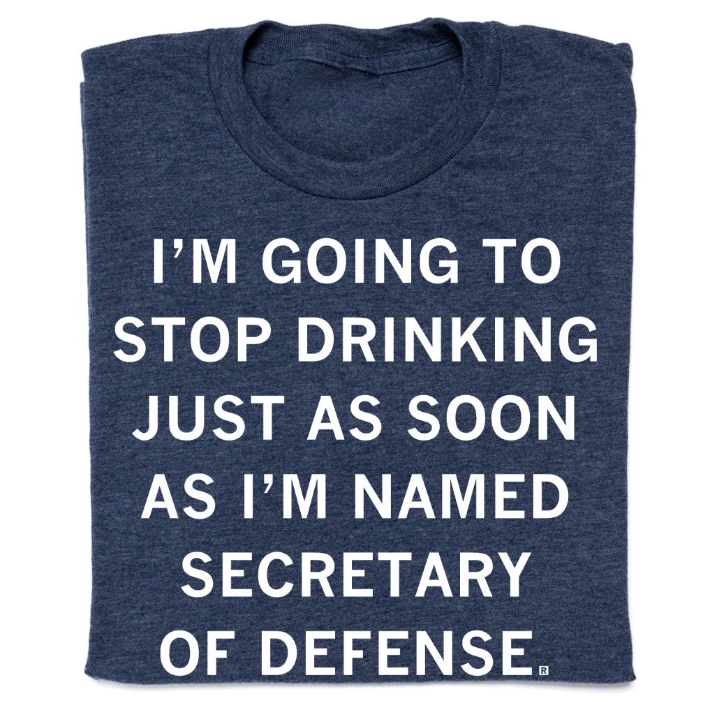 Dark blue heathered RAYGUN t-shirt with the text, I’m going to stop drinking just as soon as I’m named Secretary of Defense.