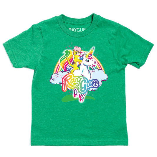 A green, union-made toddler Pride t-shirt featuring a yellow cat in a pink cowboy hat riding a white unicorn in front of a rainbow and clouds, with RayGun text printed below.