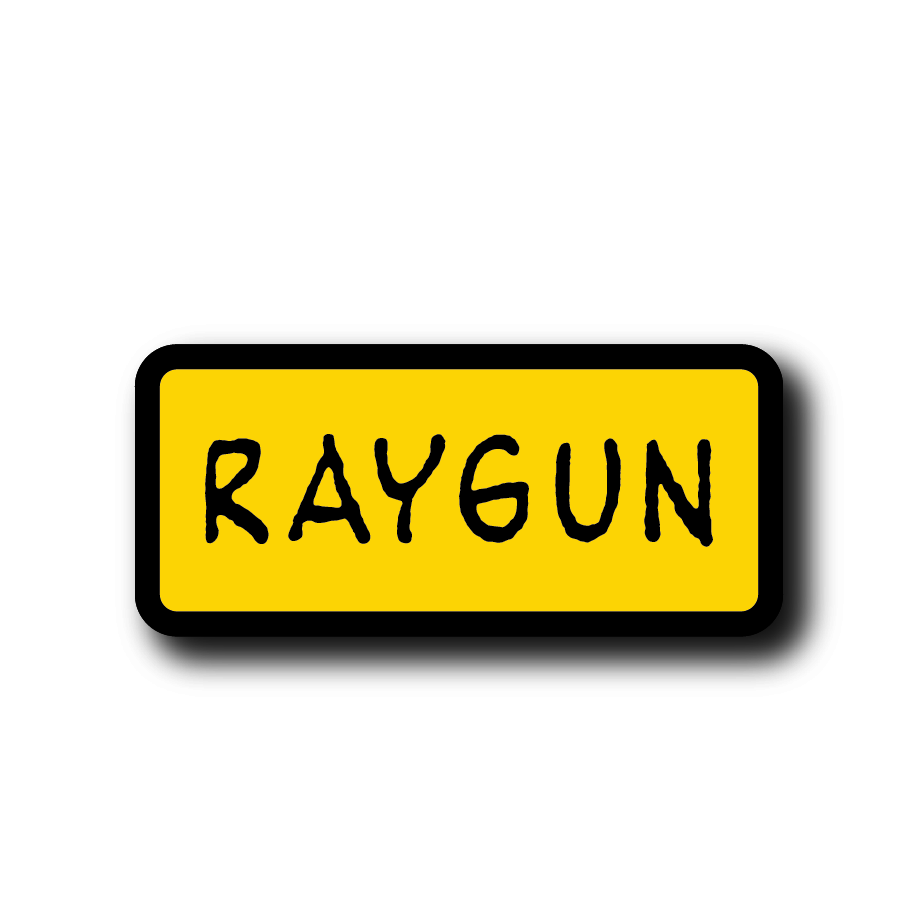 Yellow rectangular vinyl sticker with a thick black border containing the word RAYGUN in black, hand-drawn lettering.
