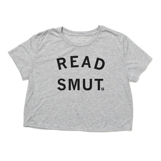 Gray cropped RAYGUN t-shirt with the text READ SMUT printed in black on the front.