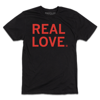 Short sleeve black t-shirt with left aligned red print text that reads "REAL LOVE"
