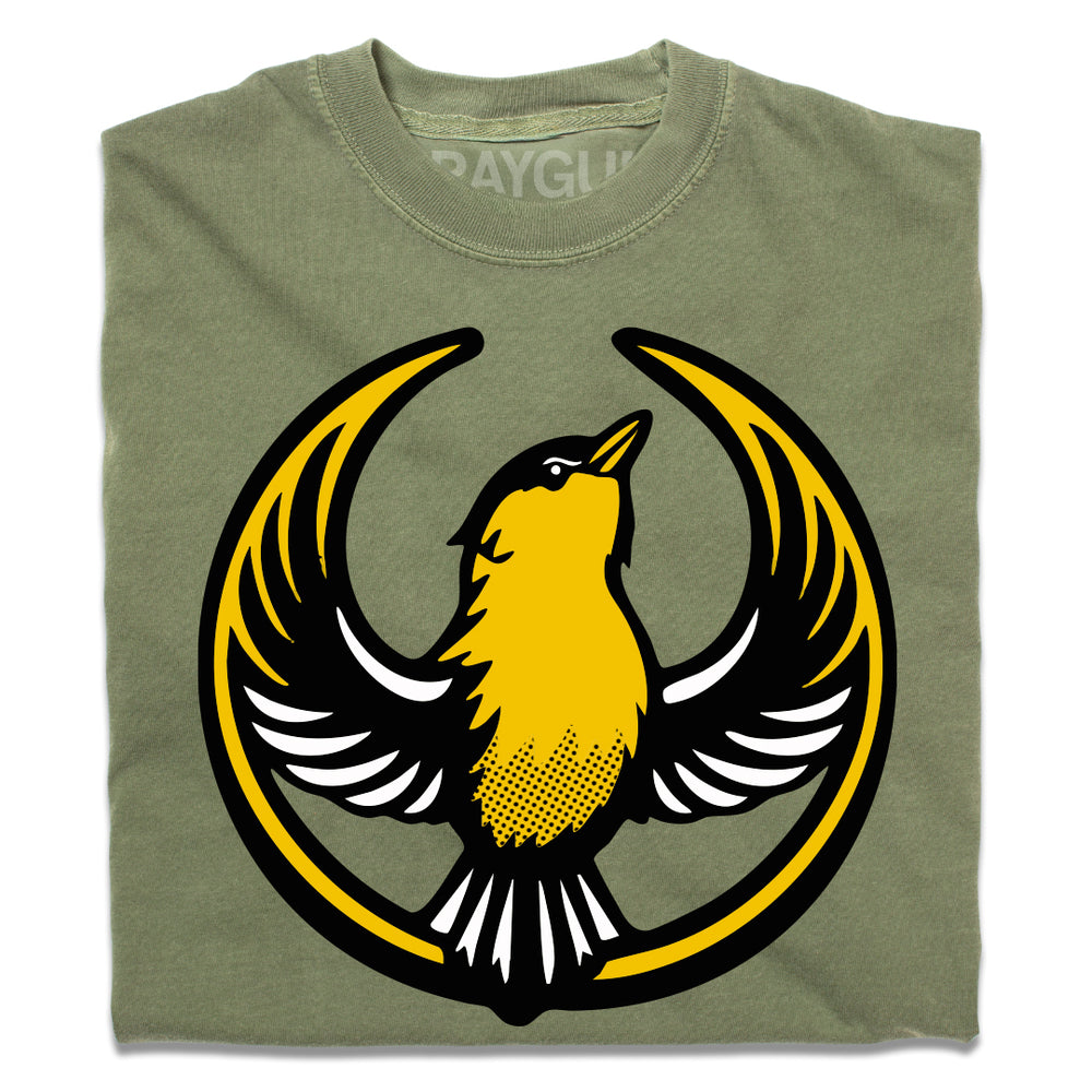 A folded hemp green heavyweight shirt with the Rebel Goldfinch Alliance Logo. It uses a goldfinch with outstretched wings to mimic the shape of the Star Wars Rebel Alliance Logo. The goldfinch  is printed with black, gold, and white ink.