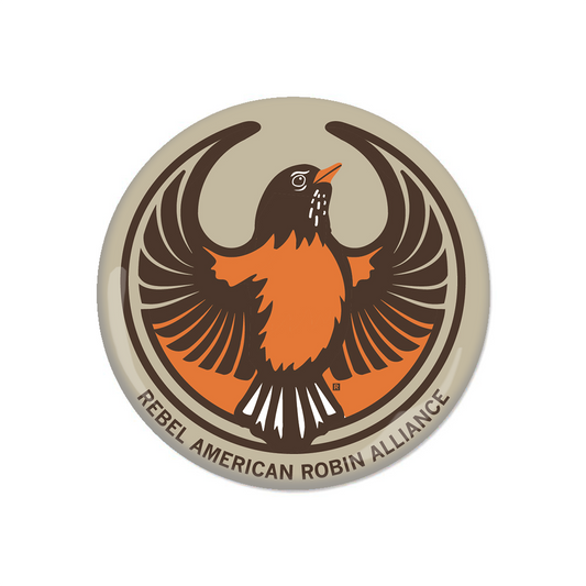 Round metal button featuring an orange and brown American robin with wings spread, encircled by the text REBEL AMERICAN ROBIN ALLIANCE.