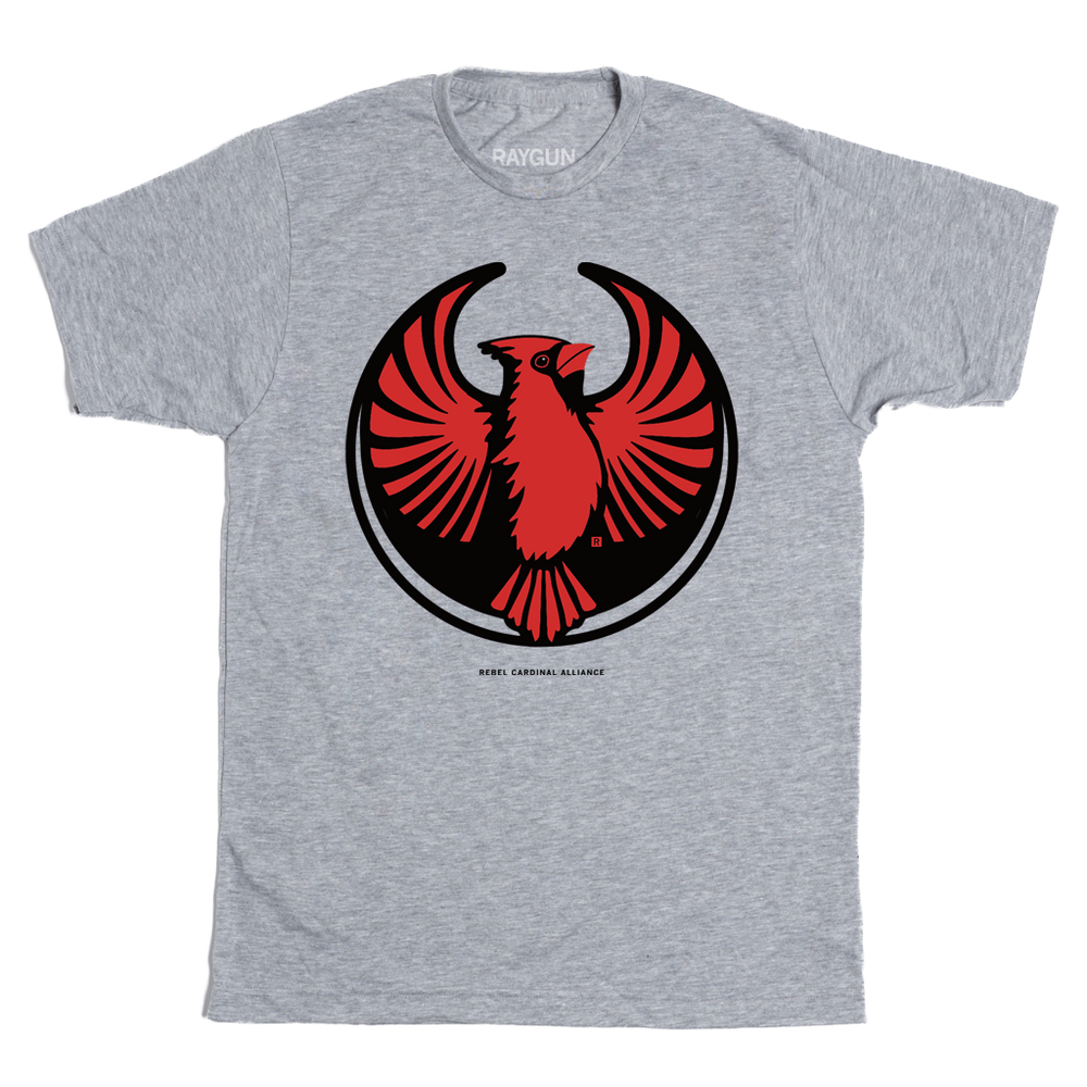 A heather grey shirt with the Rebel Northern Cardinal Alliance Logo. It uses a northern cardinal with outstretched wings to mimic the shape of the Star Wars Rebel Alliance Logo. The northern cardinal is printed in red and black ink.