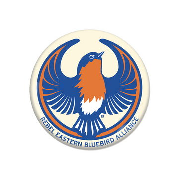 A circular logo featuring a Rebel Eastern Bluebird with an orange chest and outstretched wings, with the text REBEL EASTERN BLUEBIRD ALLIANCE curved along the bottom.