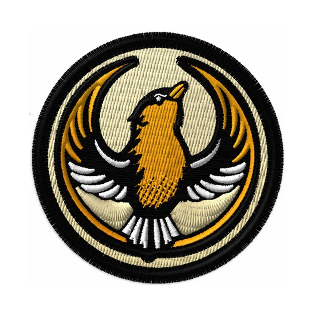 A circular embroidered patch with the Rebel Goldfinch Alliance Logo. It uses a goldfinch with outstretched wings to mimic the shape of the Star Wars Rebel Alliance Logo. The goldfinch black, gold, and white. The border of the patch is black and the rest of the patch is very light gold.