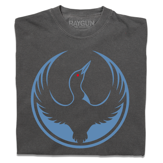 A folded heavyweight charcoal shirt with the Rebel Loon Alliance Logo. It uses a loon with outstretched wings to mimic the shape of the Star Wars Rebel Alliance Logo. The loon is printed blue & black with red eye.