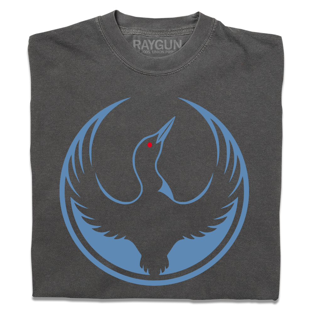 A folded heavyweight charcoal shirt with the Rebel Loon Alliance Logo. It uses a loon with outstretched wings to mimic the shape of the Star Wars Rebel Alliance Logo. The loon is printed blue & black with red eye.