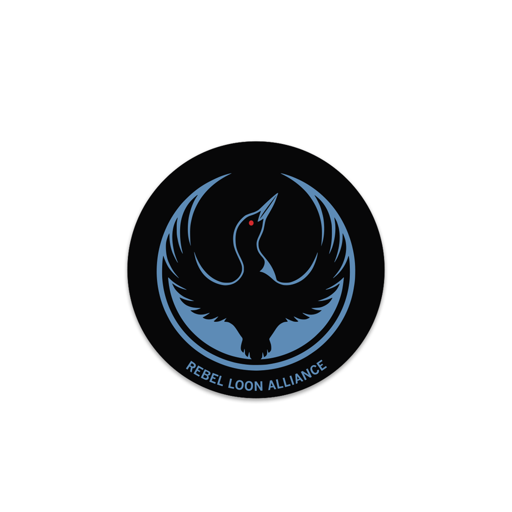 A circular black sticker with the Rebel Loon Alliance Logo. It uses a loon with outstretched wings to mimic the shape of the Star Wars Rebel Alliance Logo. The loon is printed blue & black with red eye.