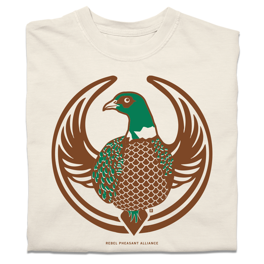 A folded heavyweight ivory shirt with the Rebel Pheasant Alliance Logo. It uses a pheasant with outstretched wings to mimic the shape of the Star Wars Rebel Alliance Logo. The pheasant is printed in green & brown ink.