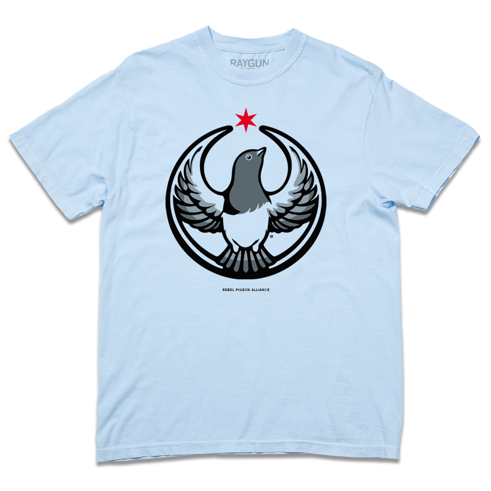 Comfort Colors light blue heavyweight t-shirt with the Rebel Pigeon Alliance Logo. It uses a pigeon with outstretched wings to mimic the shape of the Star Wars Rebel Alliance Logo. The pigeon is printed in black and grey with a red star above its head.
