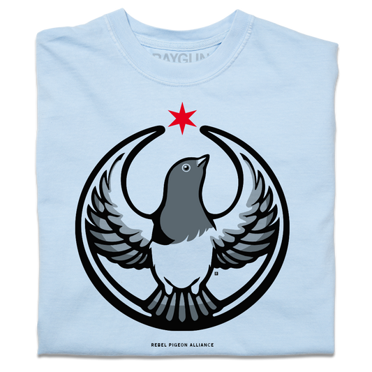A folded heavyweight light blue shirt with the Rebel Pigeon Alliance Logo. It uses a pigeon with outstretched wings to mimic the shape of the Star Wars Rebel Alliance Logo. The pigeon is printed in black and grey with a red star above its head.