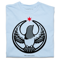 A folded heavyweight light blue shirt with the Rebel Pigeon Alliance Logo. It uses a pigeon with outstretched wings to mimic the shape of the Star Wars Rebel Alliance Logo. The pigeon is printed in black and grey with a red star above its head.